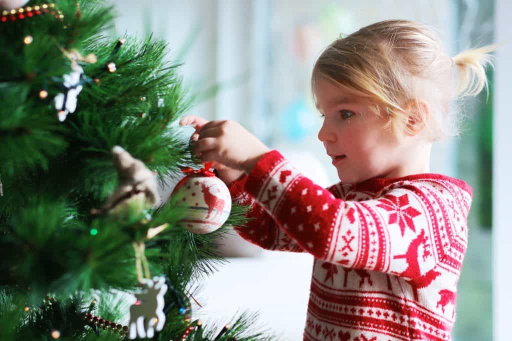 Toddler Decorating Christmas Tree